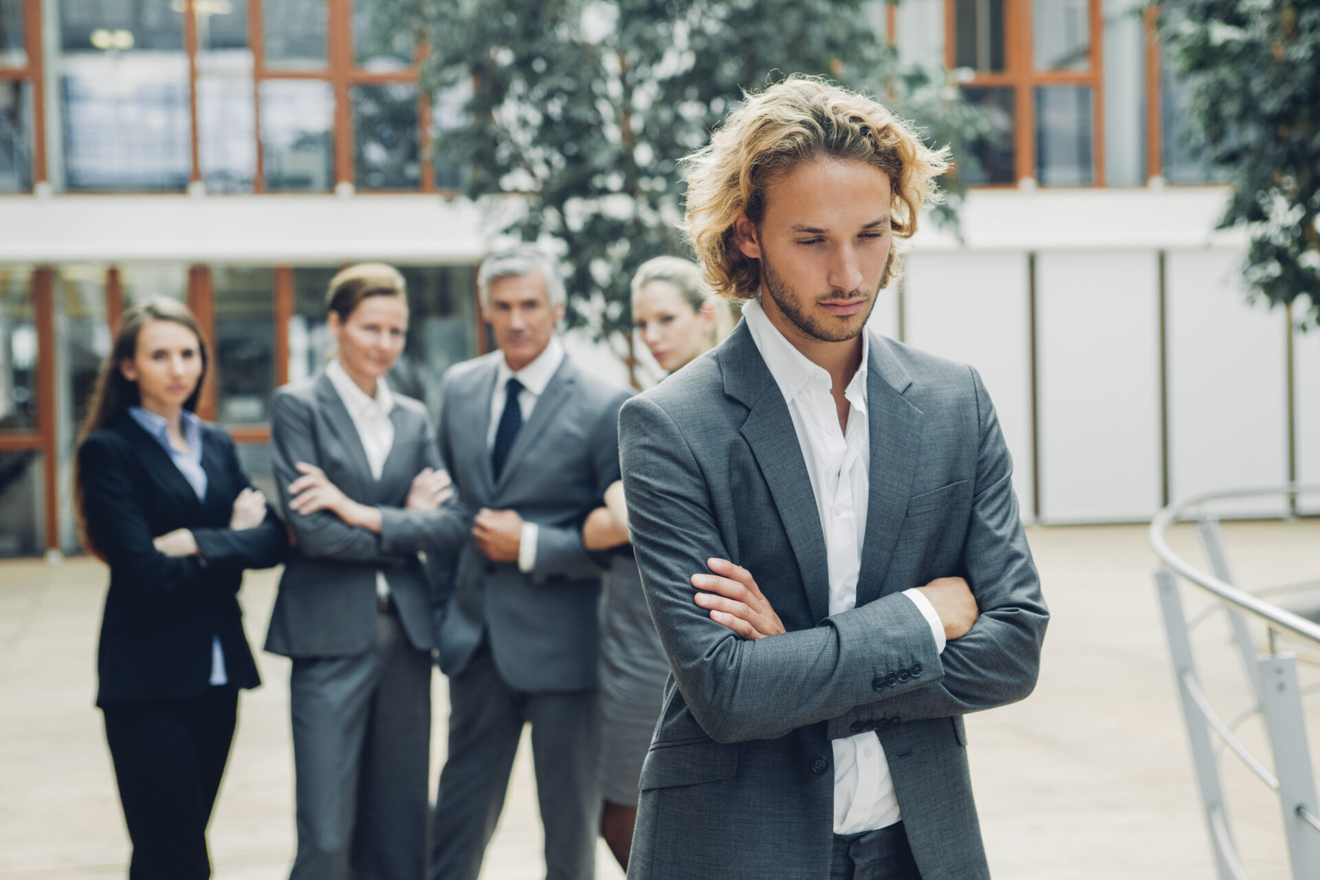 businessman with crossed arms excluded from group 2023 11 27 05 10 25 utc