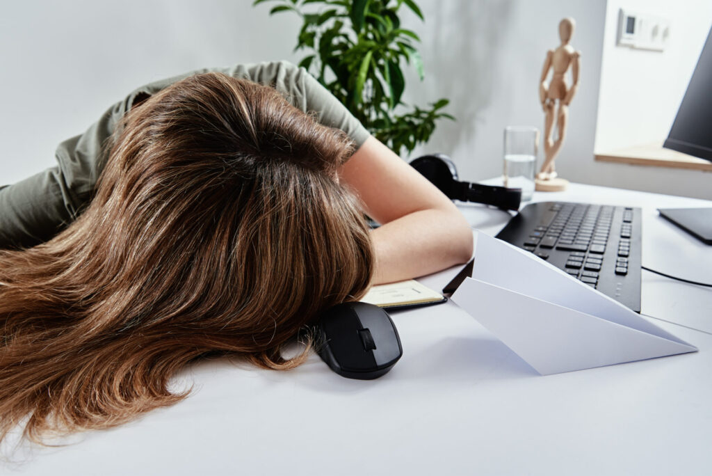 woman sleeps at home office workplace overworking 2023 11 27 05 33 23 utc